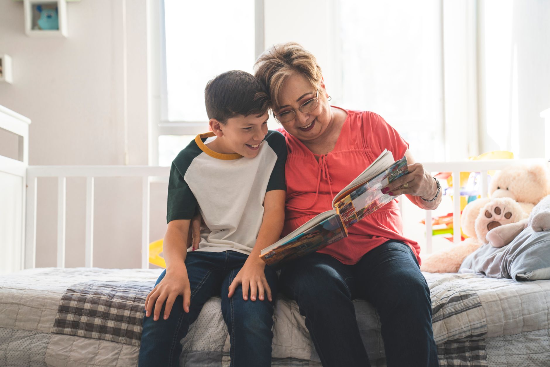Grandparent and grandchild reading together