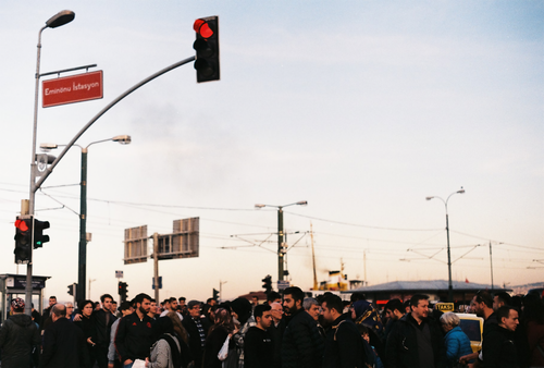 Free A busy street scene with a diverse crowd at Eminönü İstasyonu in Istanbul. Stock Photo