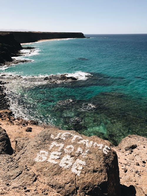 Writings on Rock Near a Body of Water