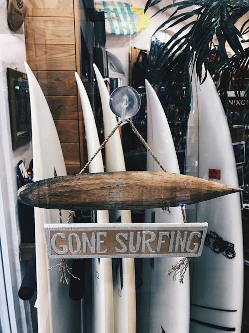 White Surfboards at a Display Window