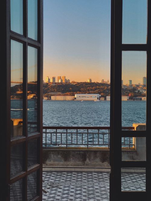 Free Captivating view from a balcony in Üsküdar, Istanbul, overlooking the Bosphorus at sunset. Stock Photo