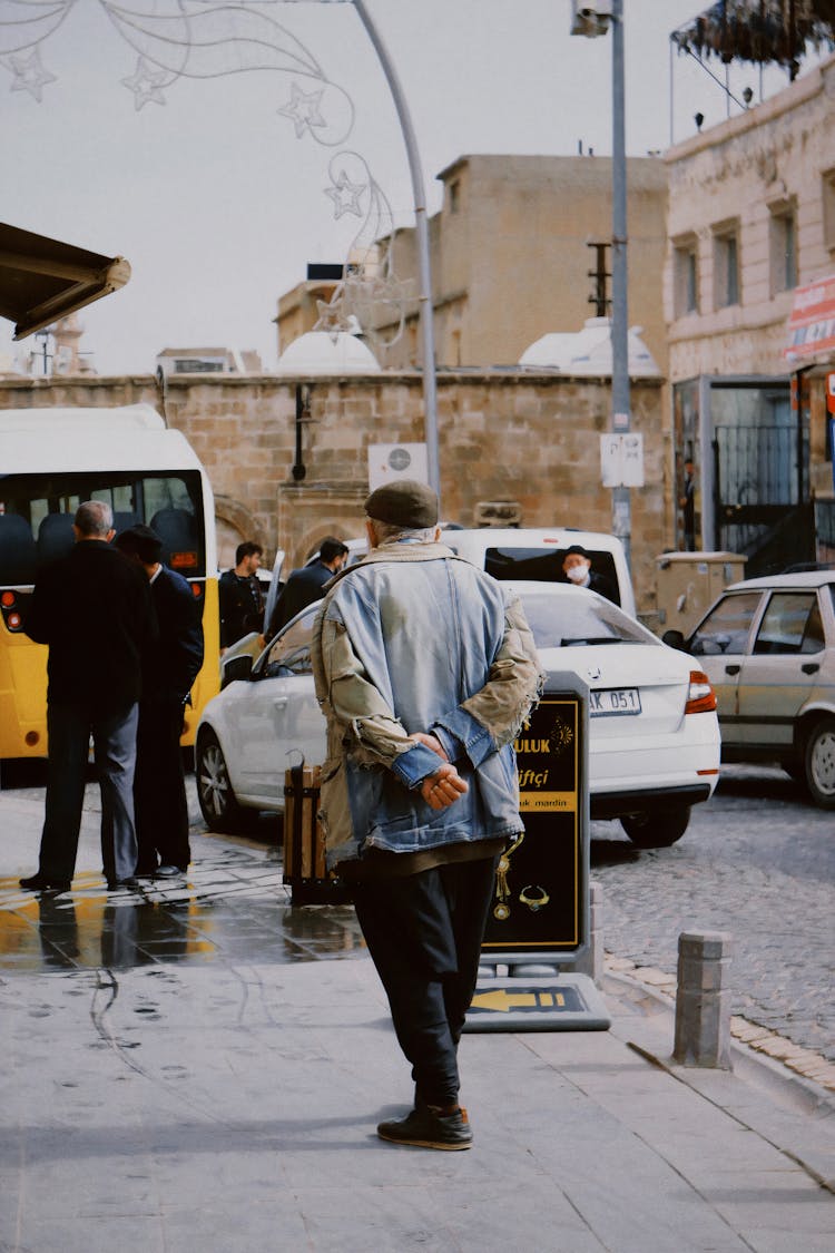 Candid Photo Of People Walking In A Town 