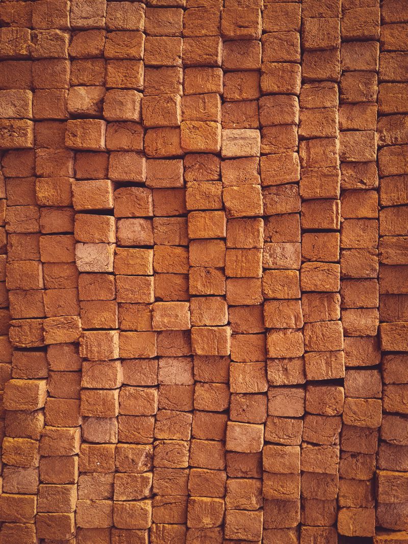 Neatly stacked construction bricks