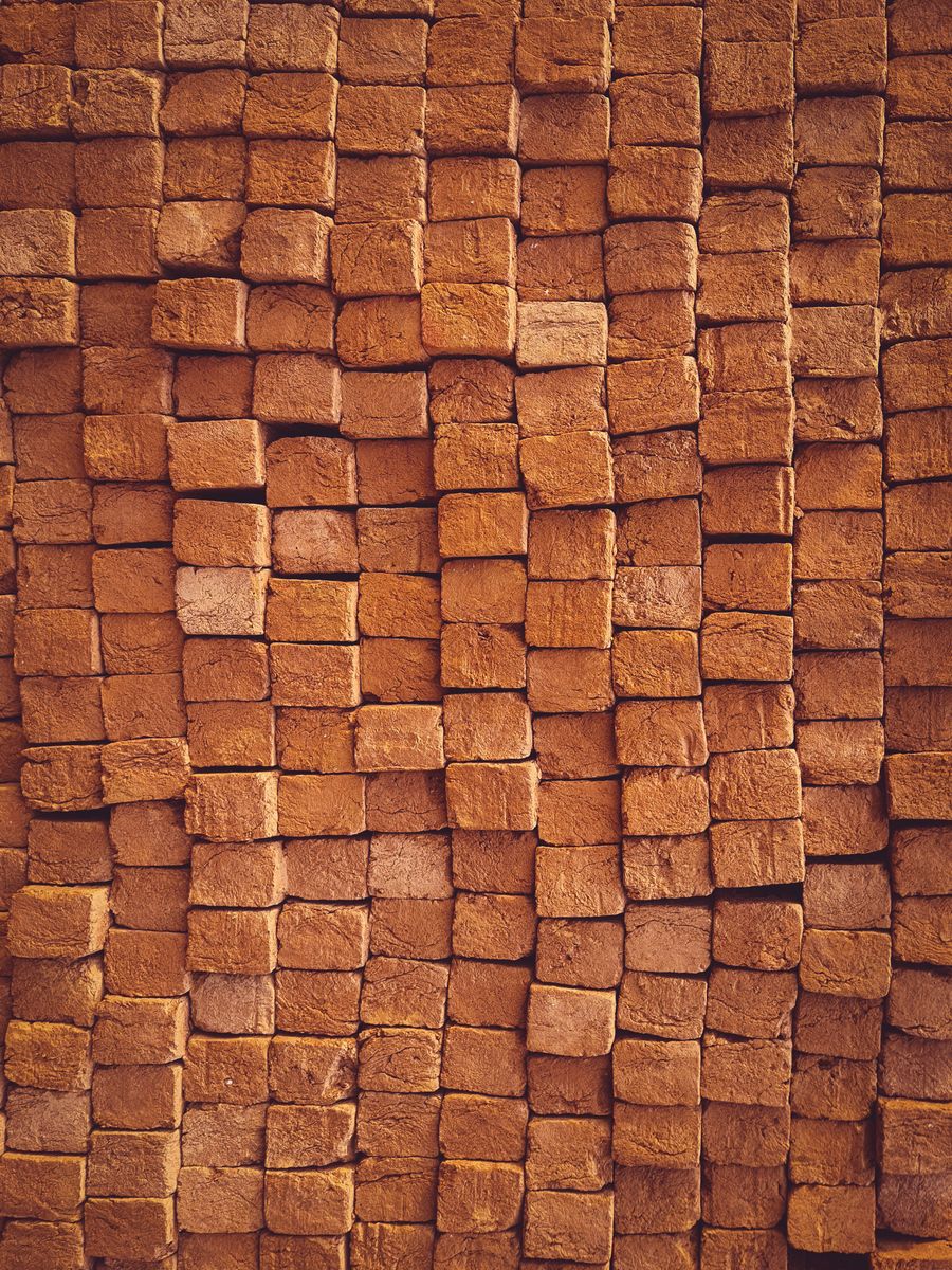 Stacked natural clay bricks