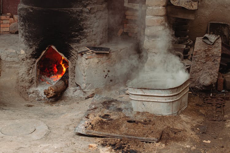 Smoke From A Large Metal Tub 