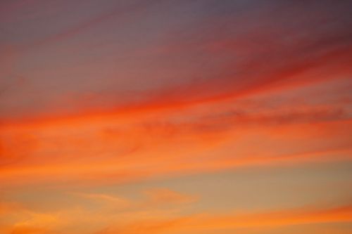 Free Captivating sunset sky with orange and red hues, creating a peaceful ambiance. Stock Photo