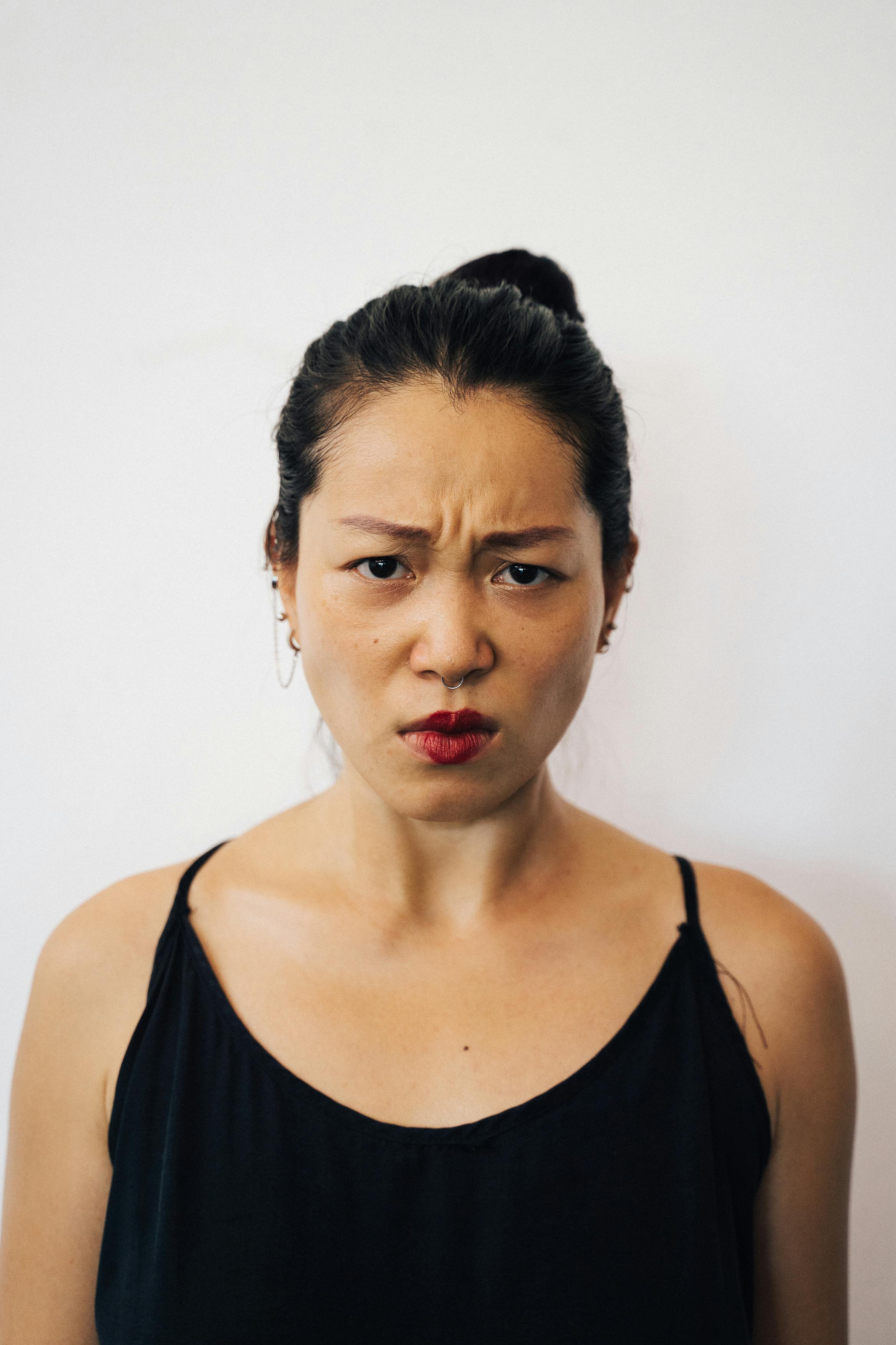 Close-up Photo of Woman's Facial Expression · Free Stock Photo
