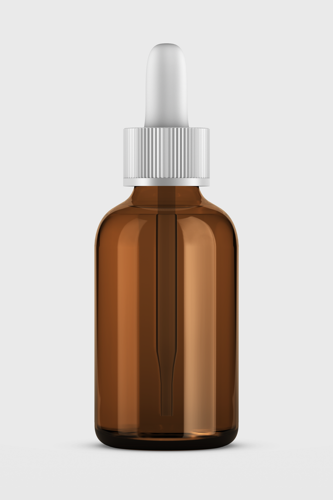 Amber glass dropper bottle against a pale studio backdrop. Photo by Mediamodifier on Pexels