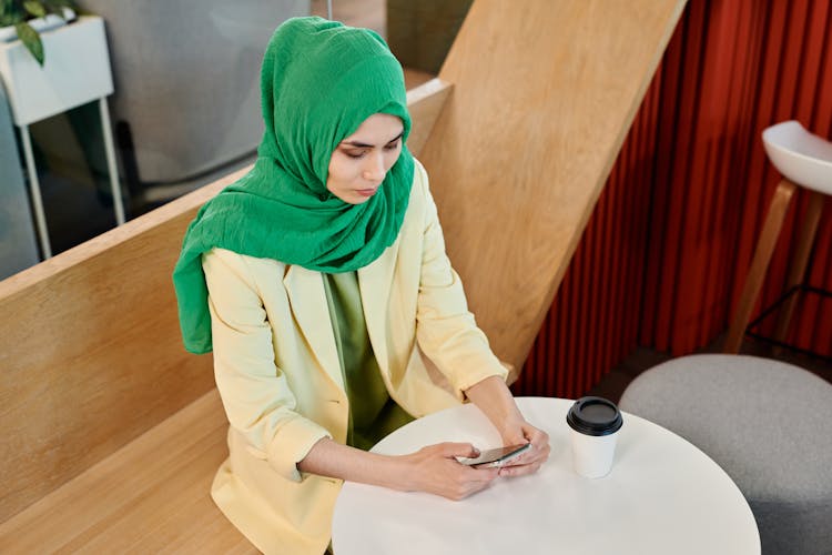 Woman In Yellow Blazer Texting