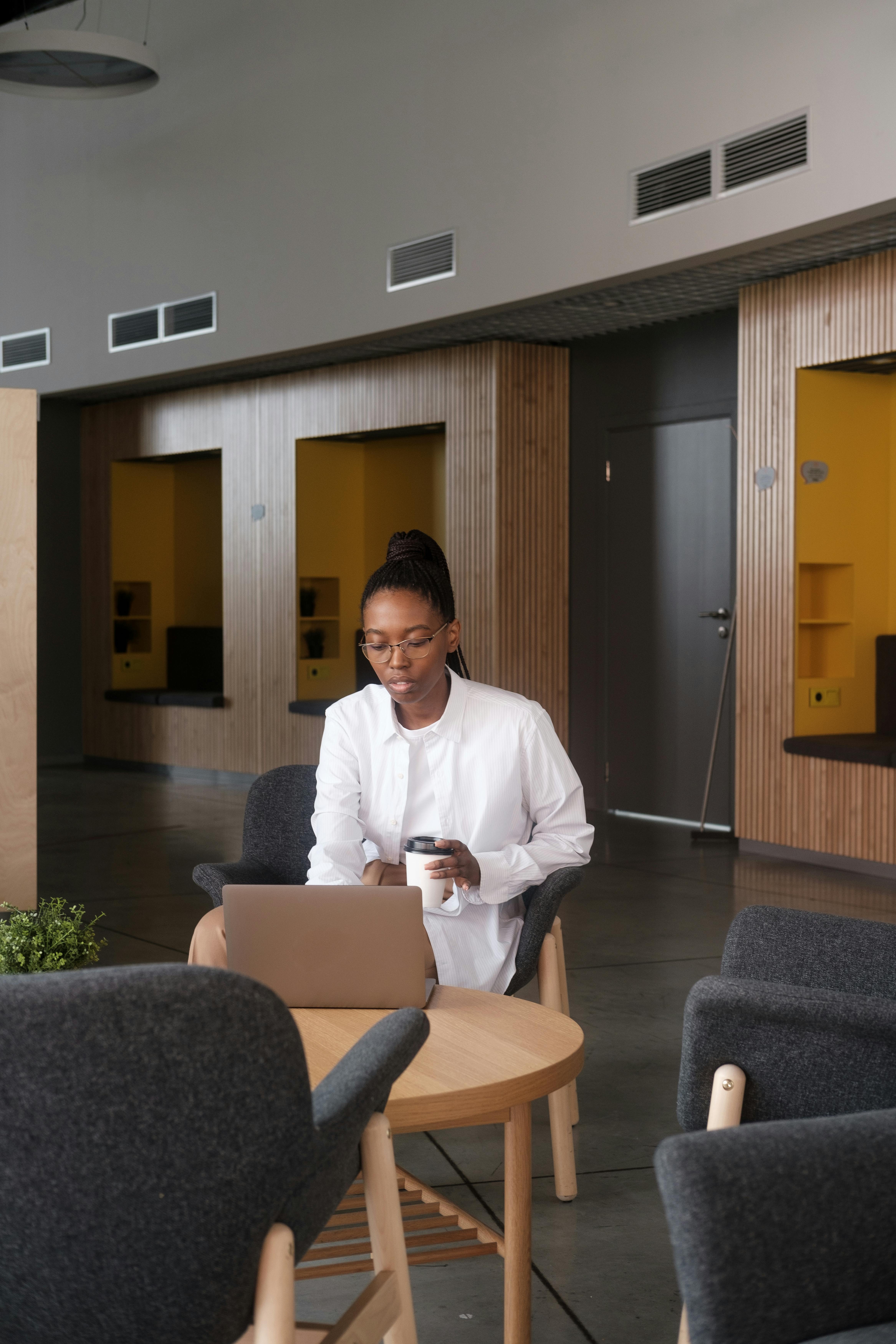 Modern professional office space with clean blue and gray design elements for corporate branding.