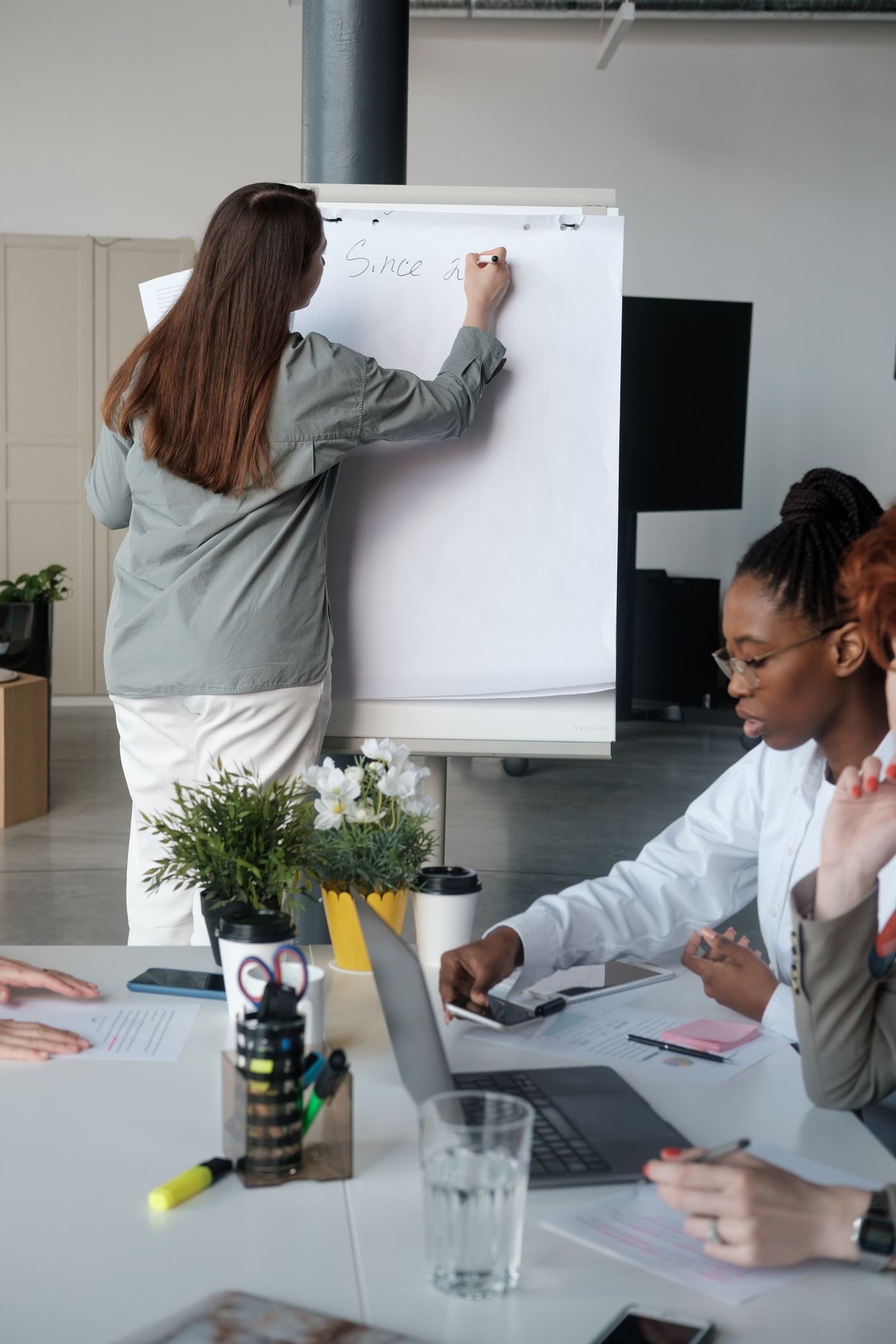 Women working together during a practical office workshop