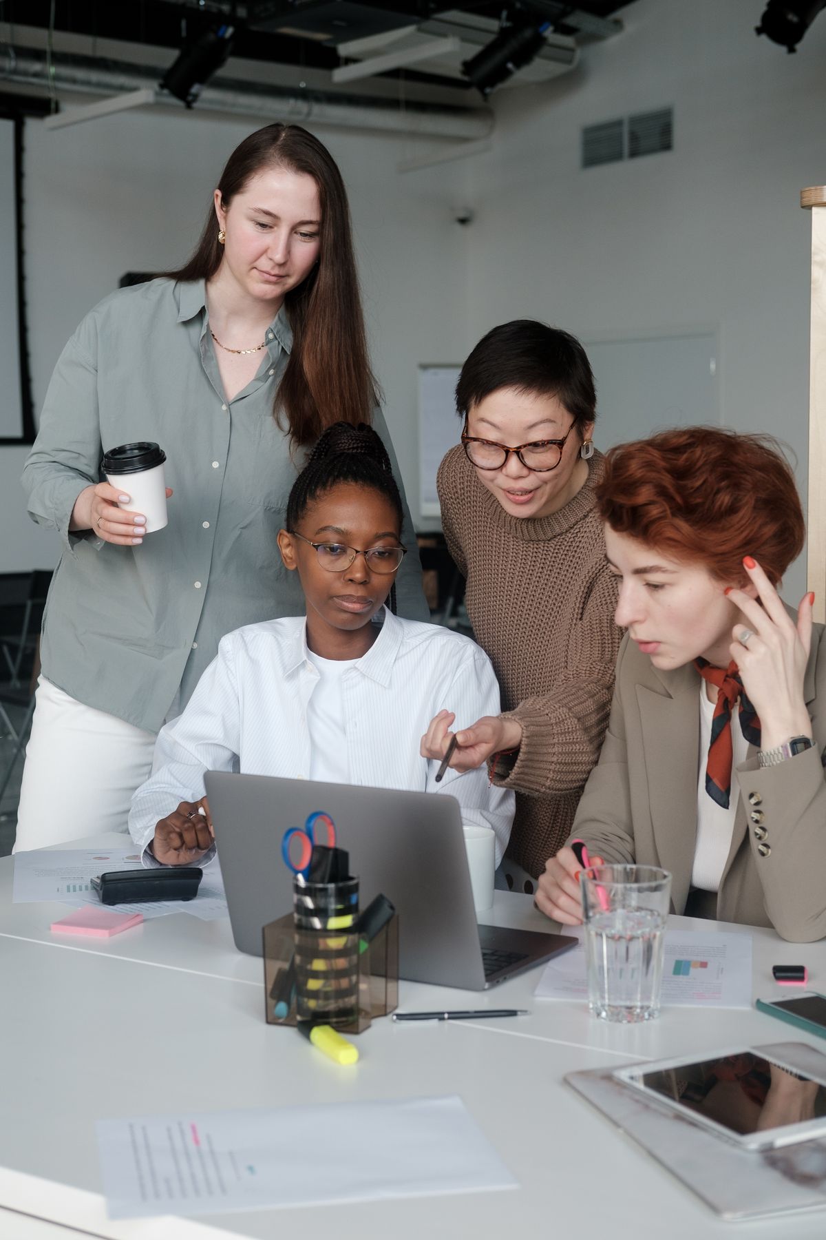 Women brainstorming together in a supportive community