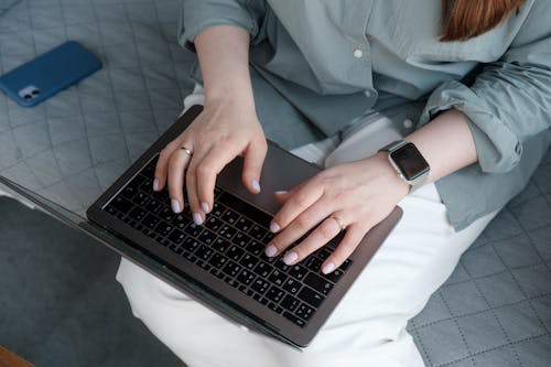 Free stock photo of hands, laptop, rings Stock Photo