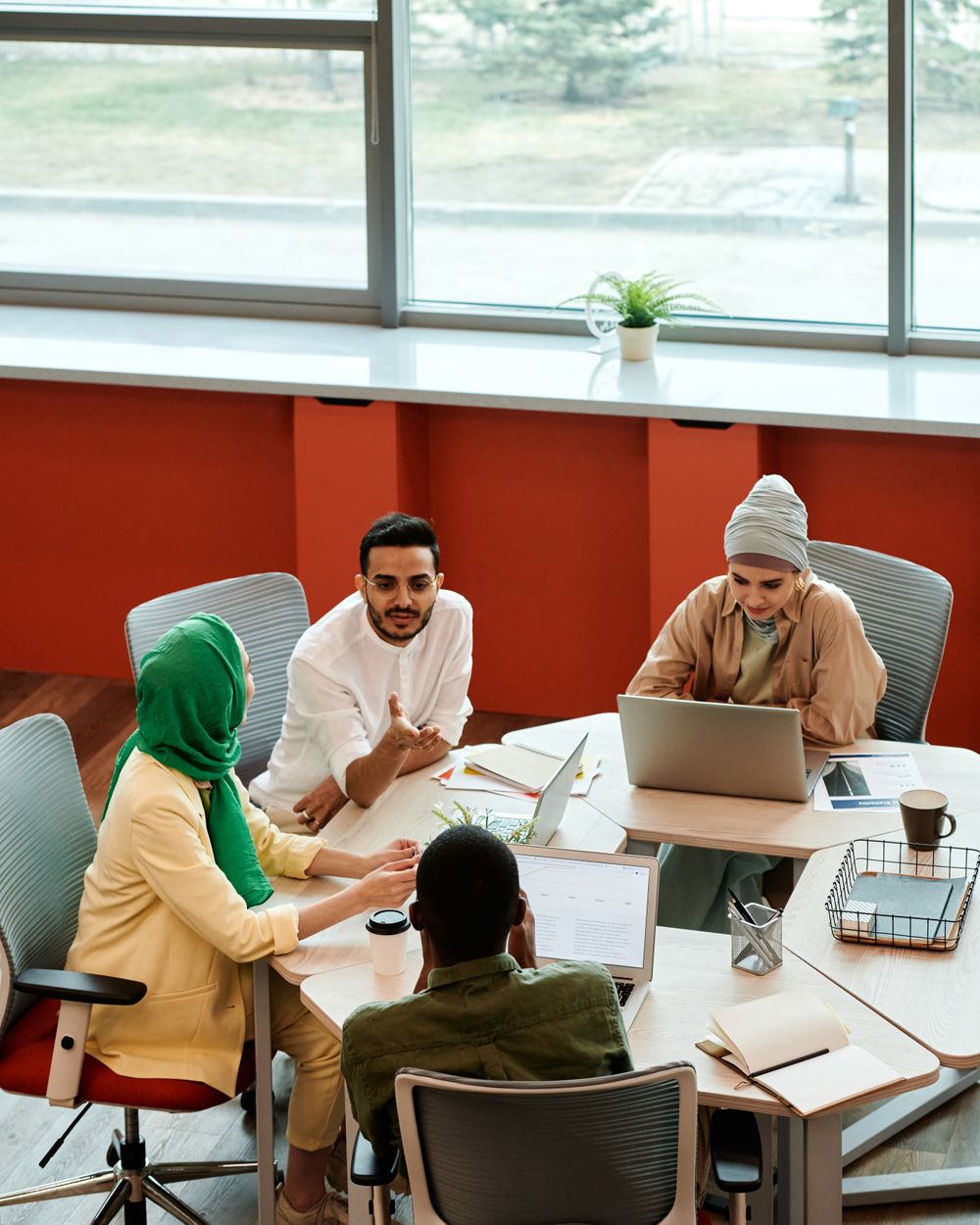 Professional team discussing business requirements with a consultant