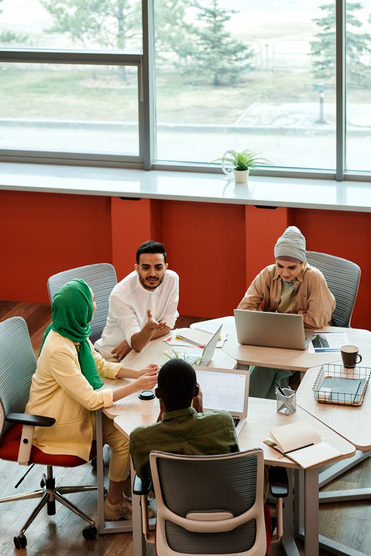 People Having A Meeting At The Office