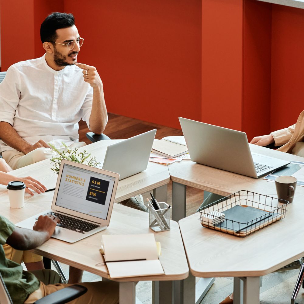 Longstanton — office relocation team moving desks and equipment