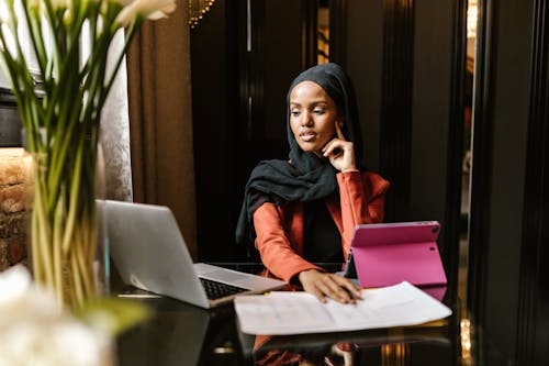 A Woman Sitting at the Table