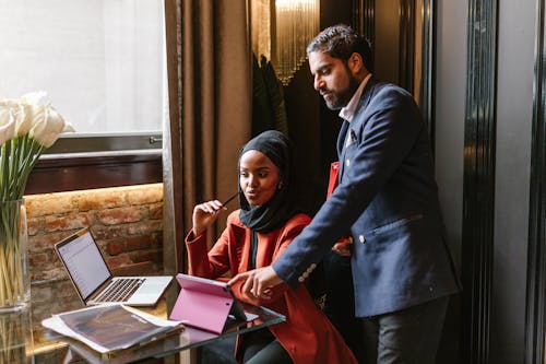 A Man and a Woman Working in an Office