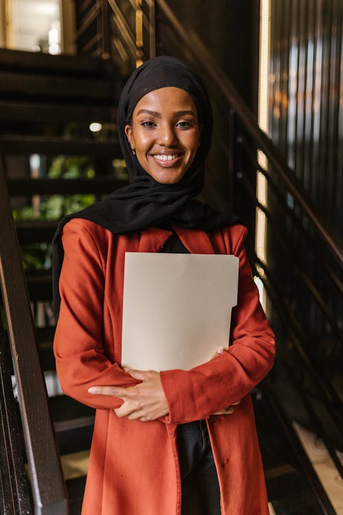 Happy Office Worker in Red Jacket