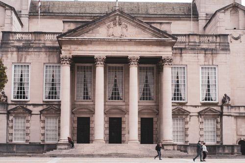 Free Classic architecture of a historic building in Leeds with people walking by. Stock Photo
