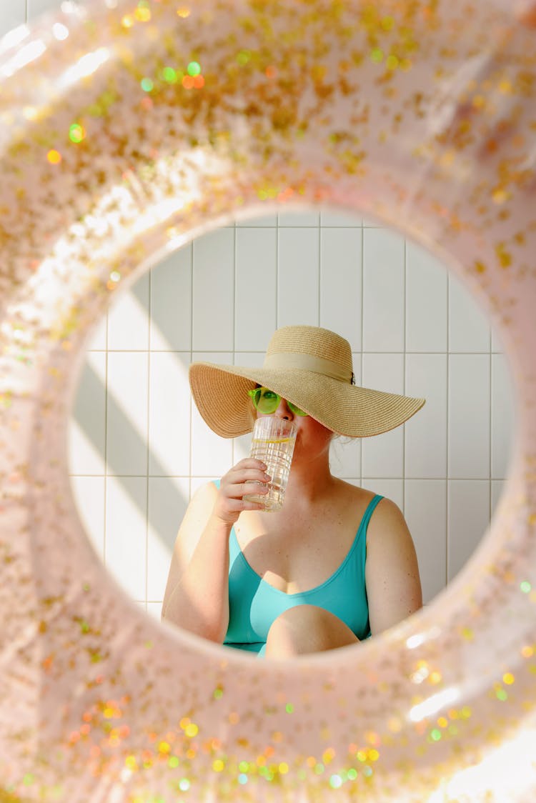 Woman Drinking Lemon Water