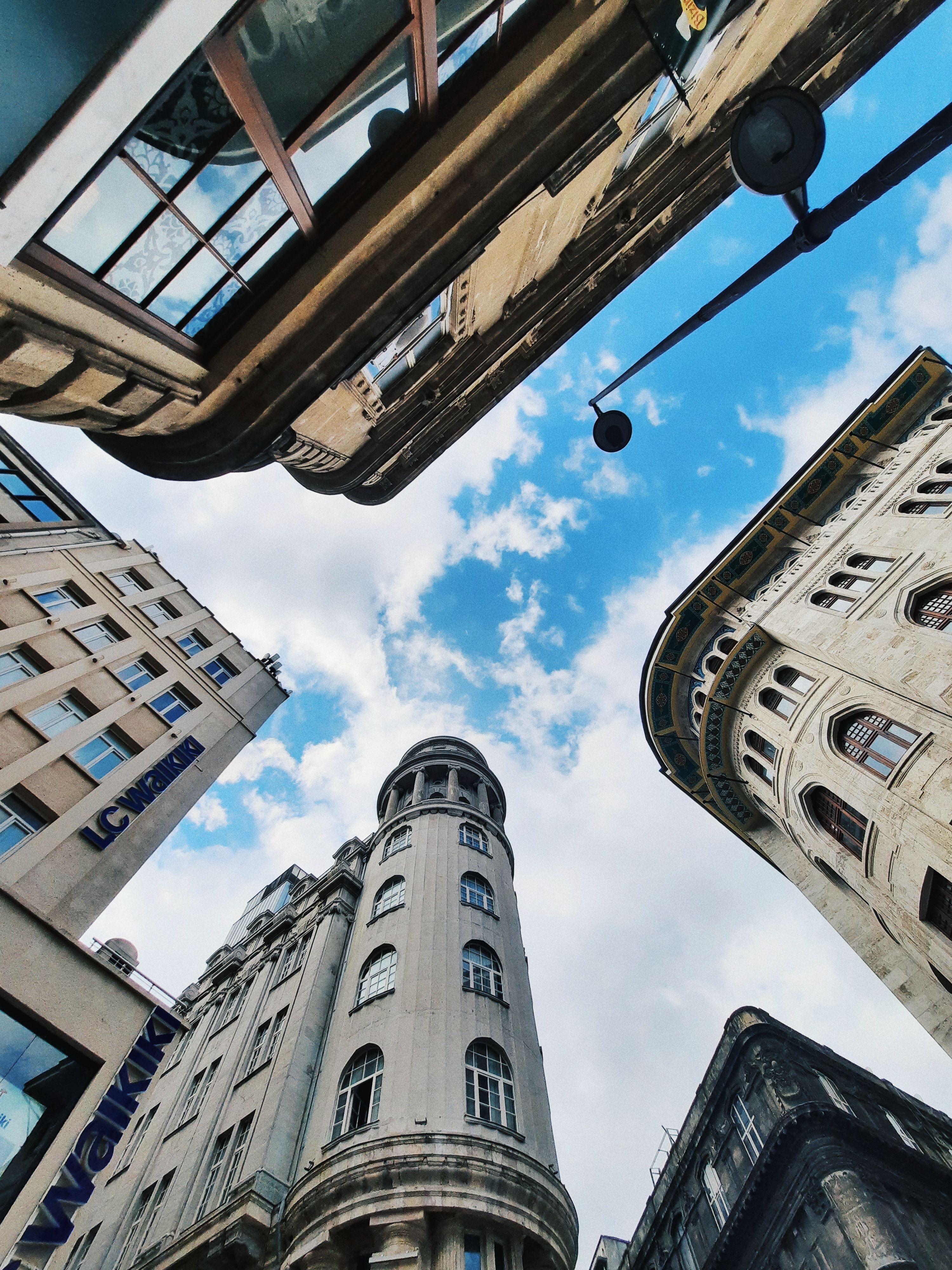 Buildings under Cloudy Sky · Free Stock Photo