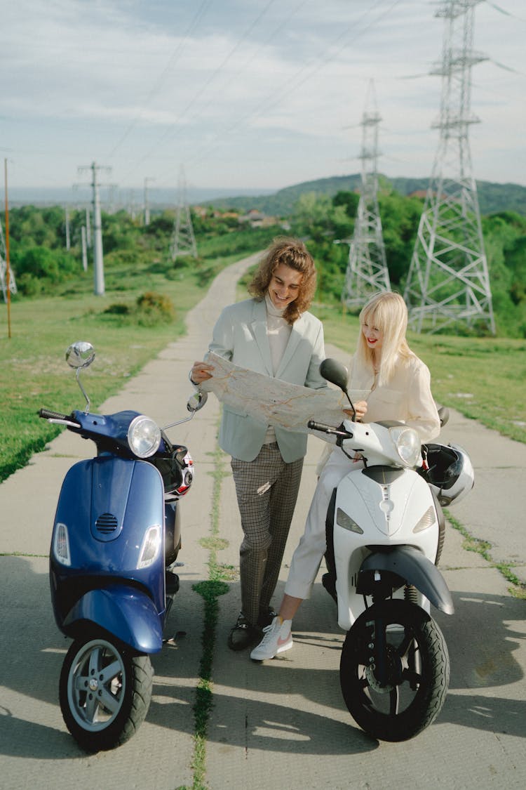 
A Couple Looking At A Map