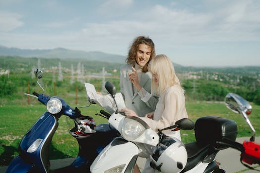 Two young travelers on scooters enjoy a sunny countryside road trip, exploring maps and planning their journey.