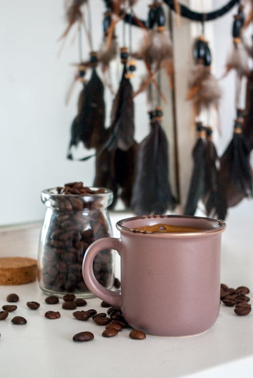 Coffee Beans and Coffee Cup