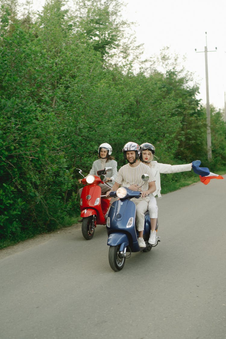 Friends Riding Scooter Motorcycles