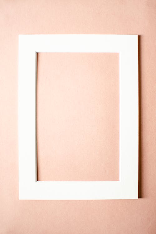 A Close-Up Shot of a White Picture Frame