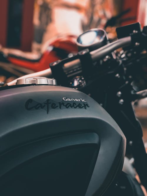 Sticker on Black and Gray Motorcycle in Tilt Shift Lens