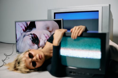 Free Photo of Woman Hugging CRT Television Stock Photo