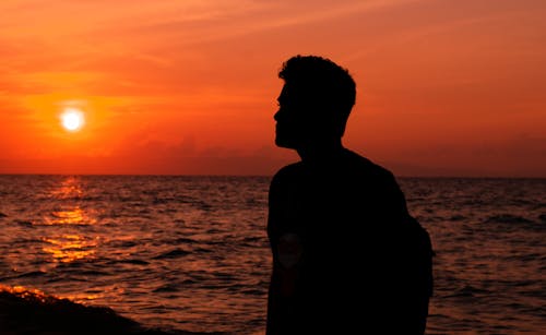 
A Silhouette of a Man during a Sunset