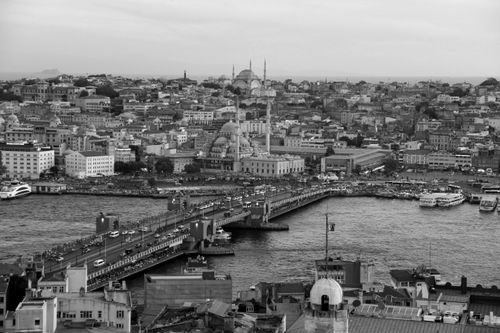 Free Aerial black-and-white view of Galata Bridge over Golden Horn in Istanbul, showcasing historic cityscape. Stock Photo