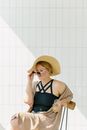 A Woman Taking off Her Sunglasses