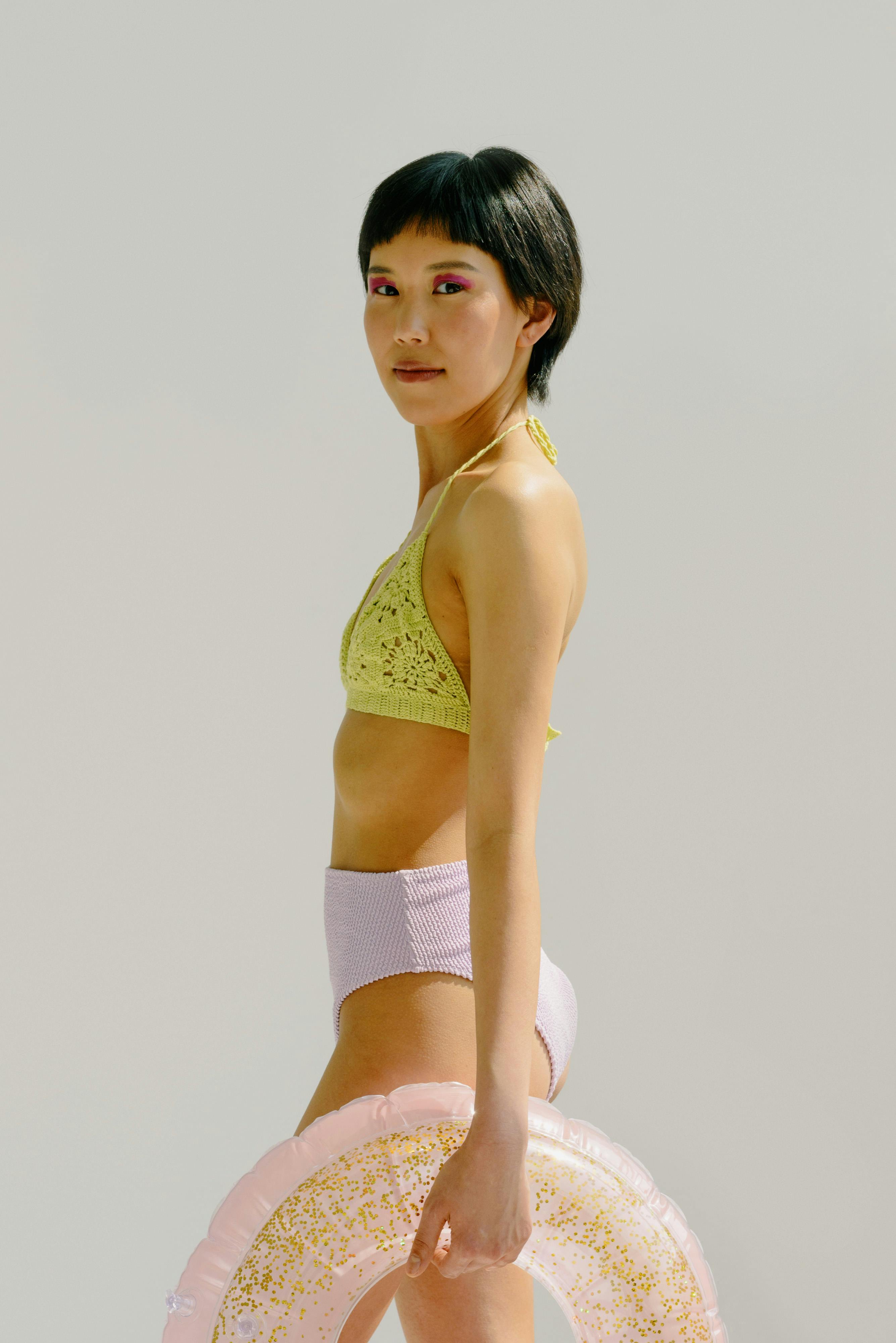 A Woman with Short Hair Holding a Swim