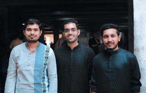 Free Three men smiling in traditional attire in Dhaka, showcasing friendship. Stock Photo