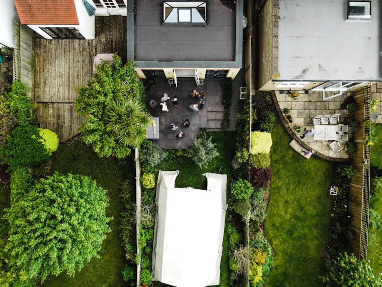 Aerial Footage Of People On A Backyard