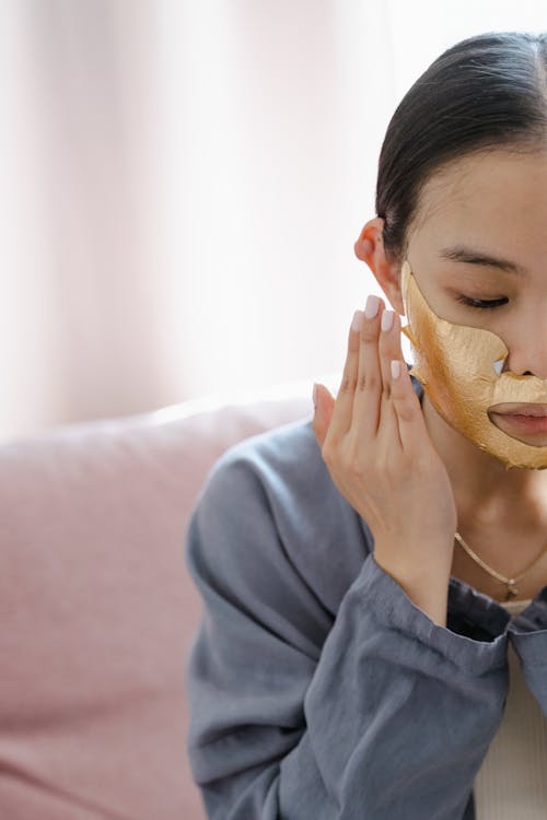 A Woman Wearing a Cosmetic Face Mask