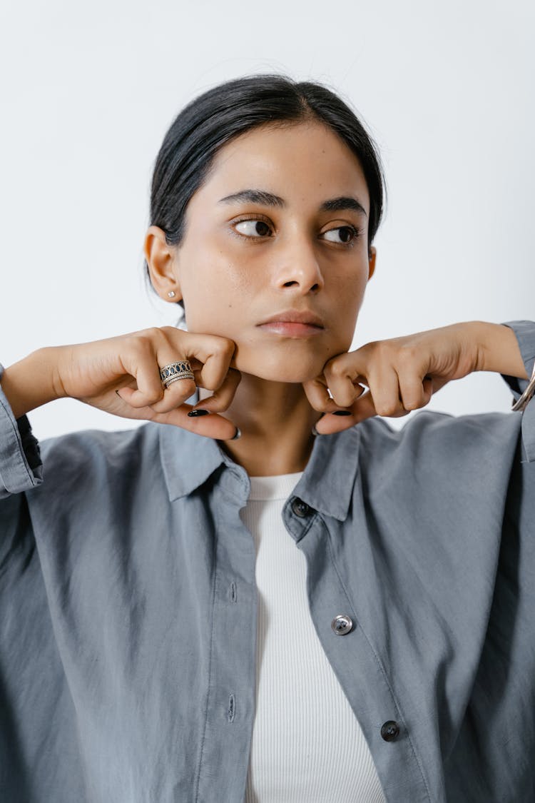 A Woman Massaging Her Jaw