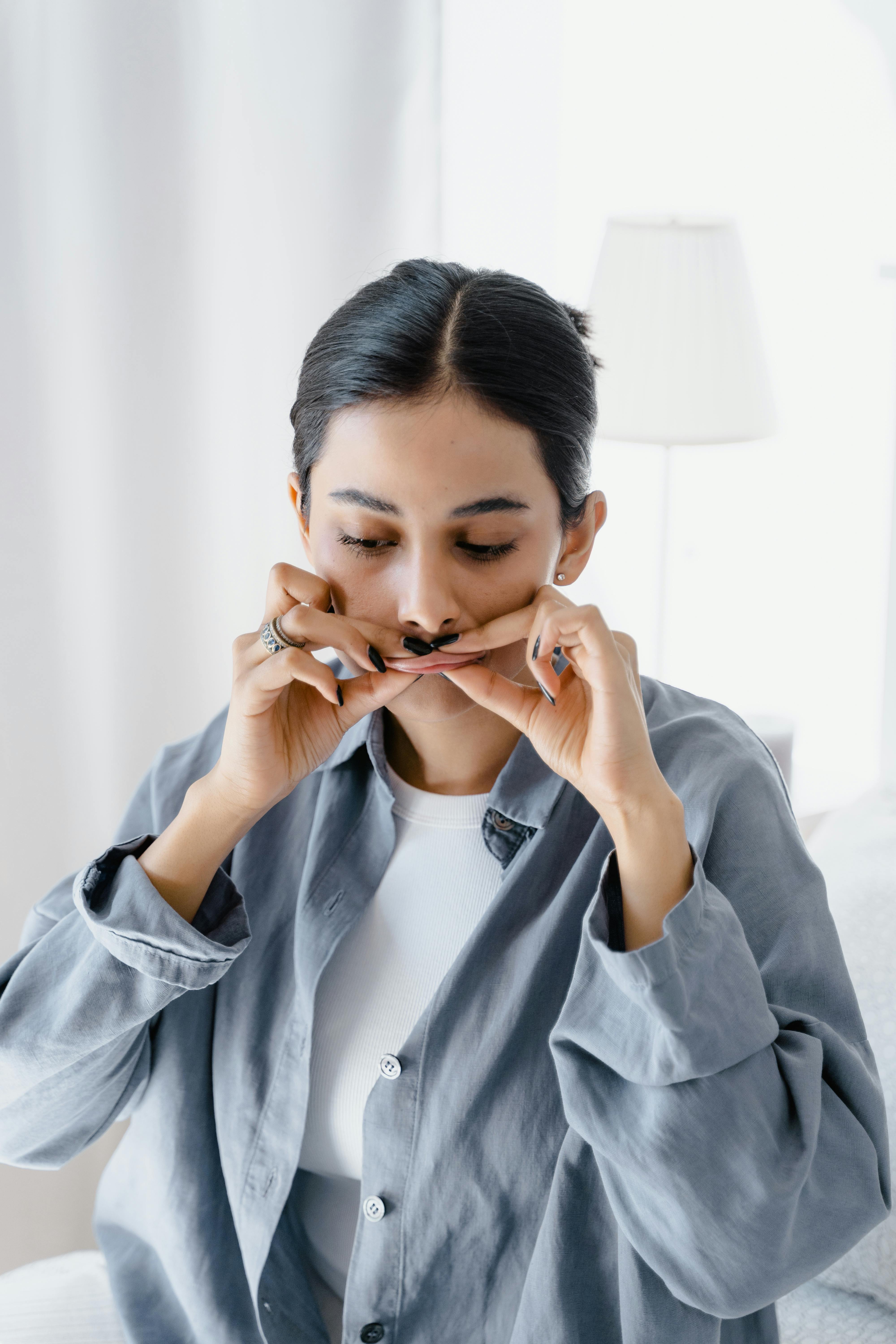 a woman pressing her lips