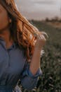 Woman in Blue Button Up Shirt