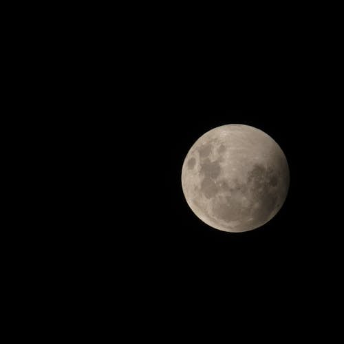 Free Full Moon Across Night Sky Stock Photo