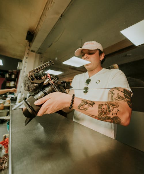 Man Holding a Camera Build 