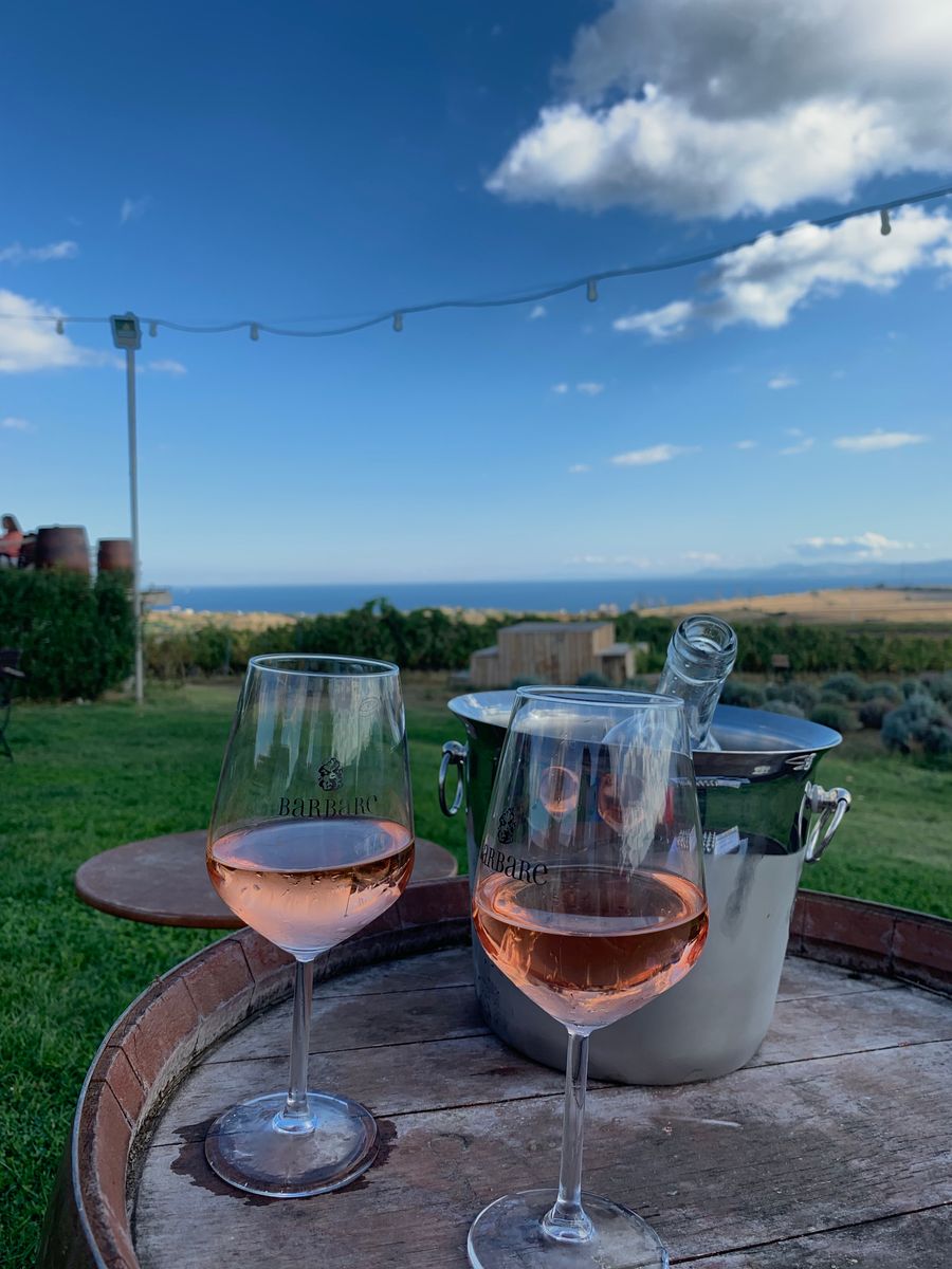 Rosé wine glasses at sunset