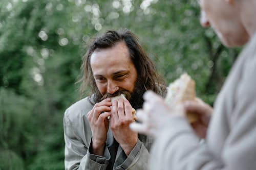 Free Homeless Man eating Sandwich  Stock Photo
