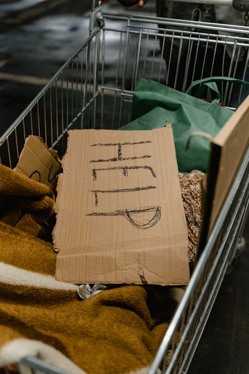 Free Help Banner in a Grocery Cart Stock Photo