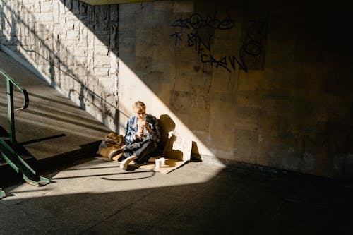 Photo of a Woman Eating Alone