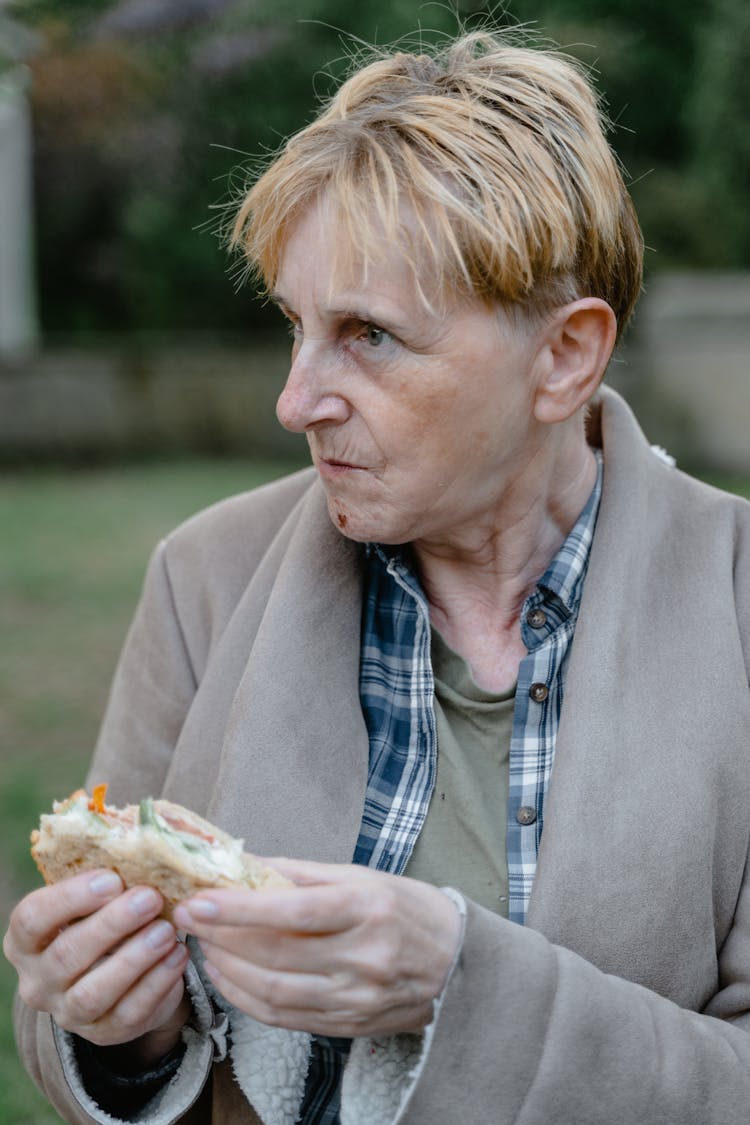 Woman Eating A Sandwich